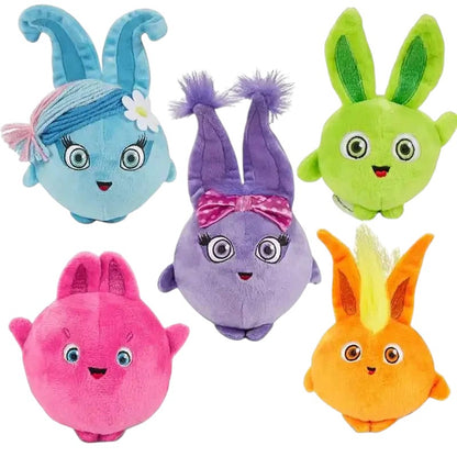 COMFORTH plush bunny toys in blue, purple, green, pink, and orange with embroidered eyes and smiles.