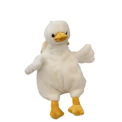 COMFORTH plush white duck backpack with yellow feet and beak, soft and whimsical design for kids and adults.