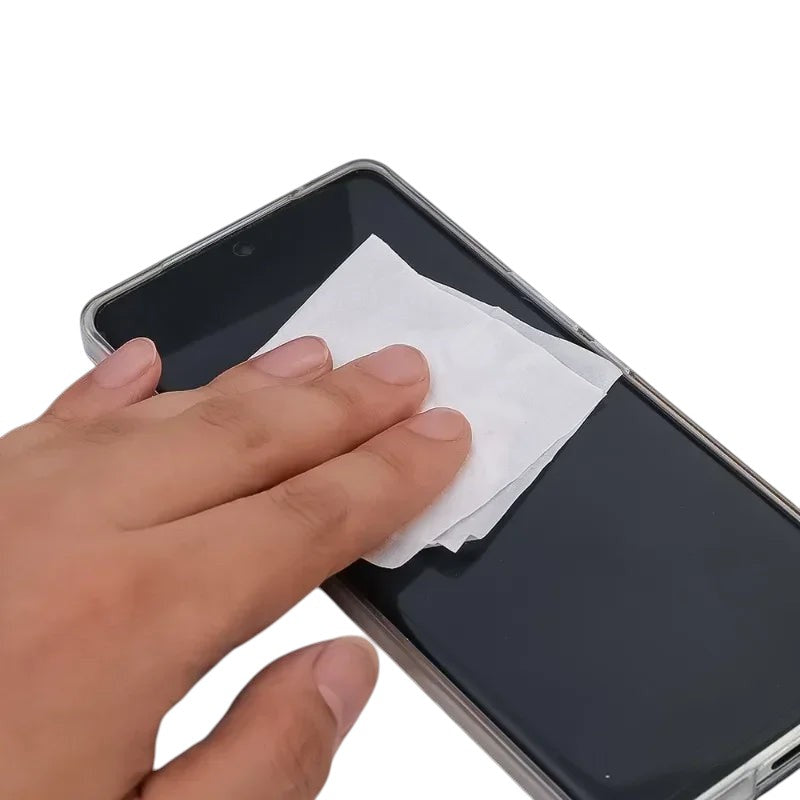COMFORTH Powerclean Anti-fog Wipes cleaning a smartphone screen for clear vision.