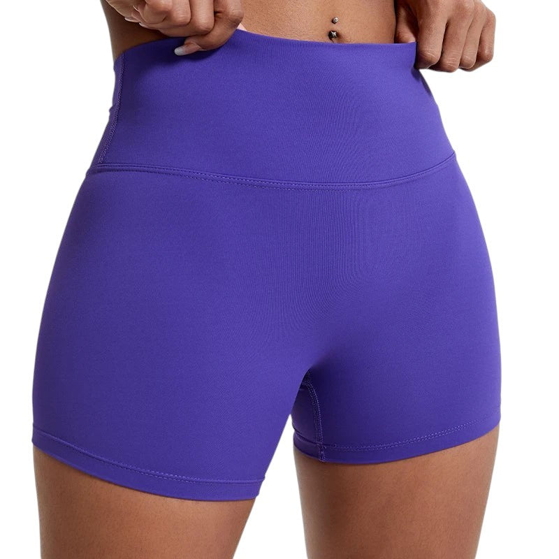 COMFORT purple high-waisted athletic shorts for women, seamless, four-way stretch, moisture-wicking fabric.