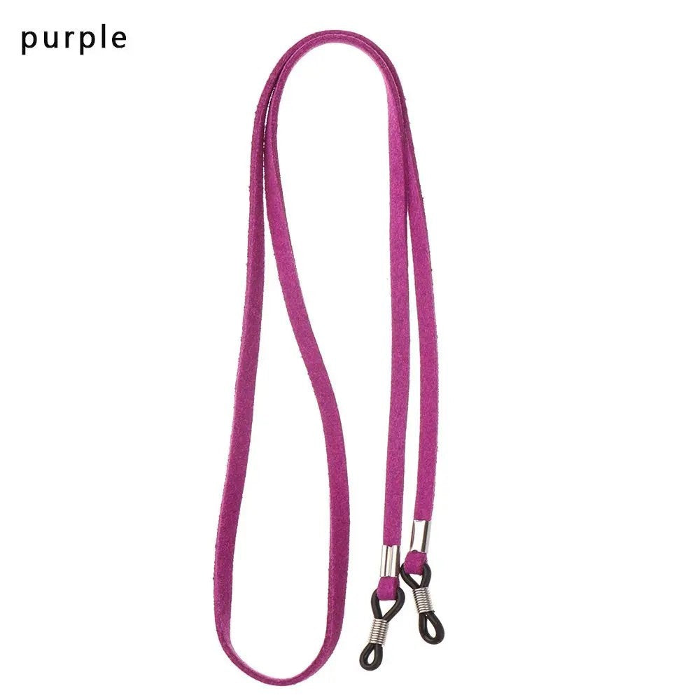 COMFORT purple suede eyeglass chain strap with adjustable silicone loops and metal connectors.
