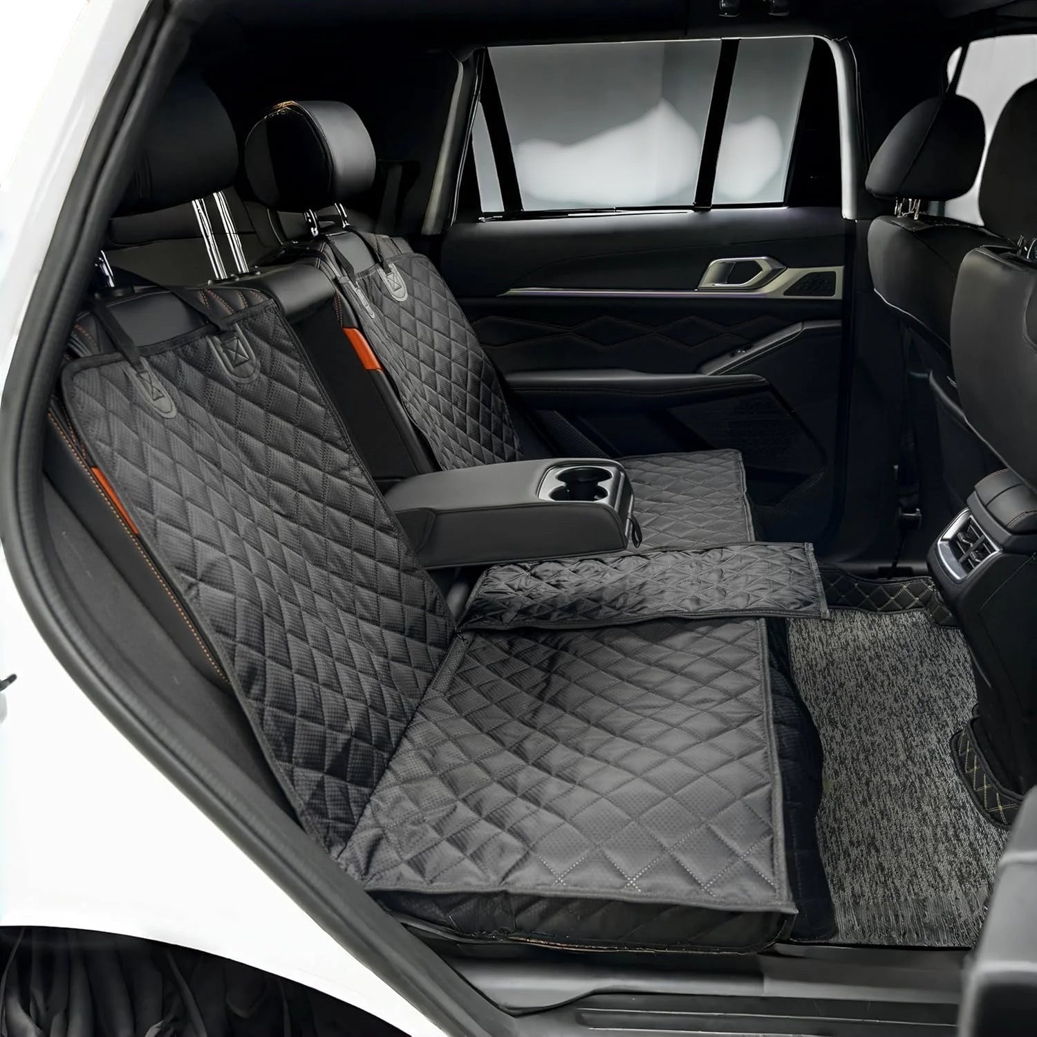 COMFORT quilted black waterproof car seat cover for back seat with orange accents and storage pockets.