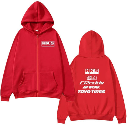 COMFORTHKS graphic zip-up hoodie in red with multiple brand logos on front and back. Features a full zip, hood, and front pockets.