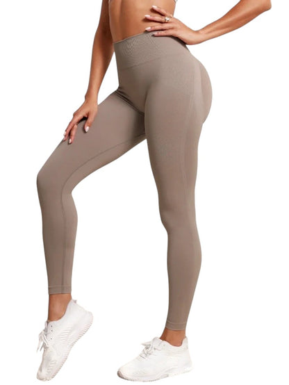COMFORT seamless high-waisted taupe workout leggings with textured detail and flattering silhouette.