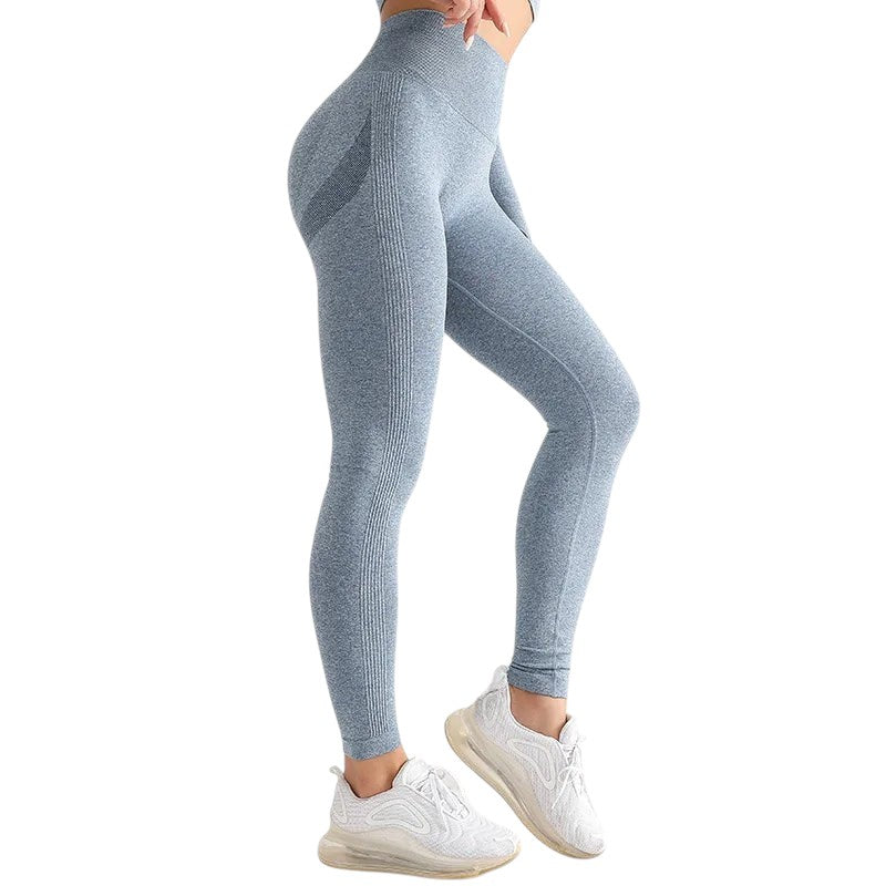 COMFORTH seamless high-waisted light blue heathered workout leggings with ribbed calf detail.