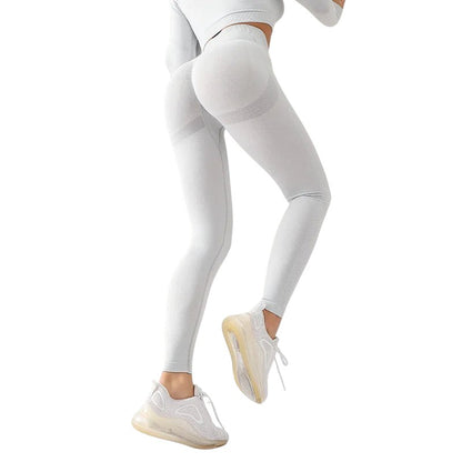 COMFORTHere seamless high-waisted light grey workout leggings with textured detail and ribbed calves.
