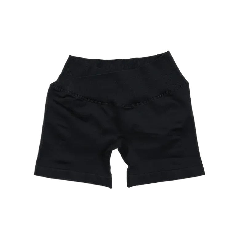 COMFORTH seamless black athletic shorts with V-waistband and moisture-wicking fabric.