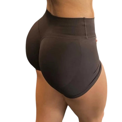 COMFORTH seamless V-waist athletic shorts in dark grey. Flattering, squat-proof design for workouts.