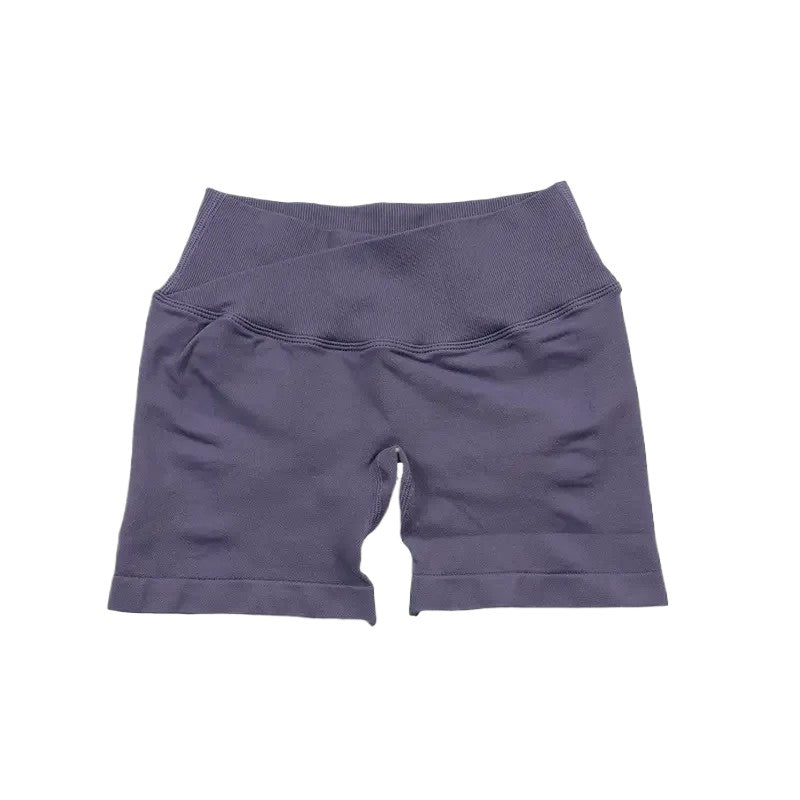 COMFORTH seamless V-waist athletic shorts in a muted purple, made from a stretchy, breathable fabric.
