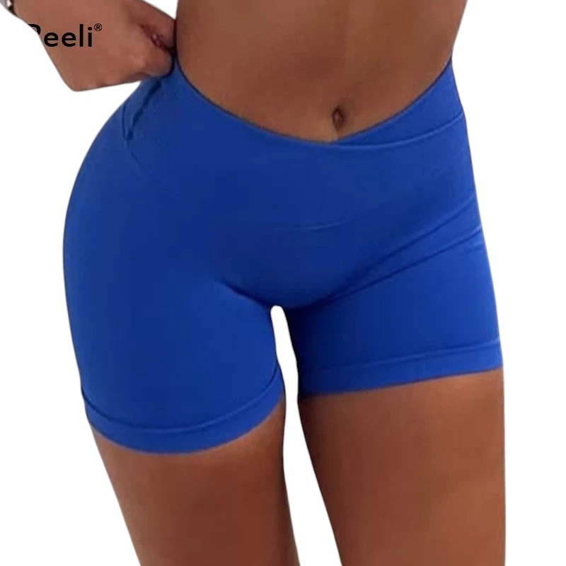 COMFORTH seamless V waist athletic shorts in royal blue. Stretchy, breathable fabric for workouts.