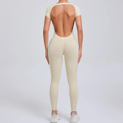 COMFORTH short sleeve full length bodysuit in cream with a low back and v-shaped seam detail. Ideal for activewear.