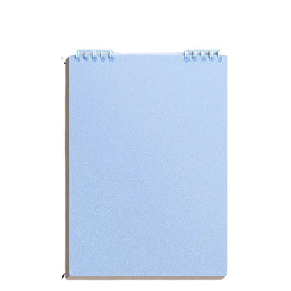 COMFORT spiral bound notebook in sky blue with a textured cover and silver spiral binding. Ideal for notes and journaling.