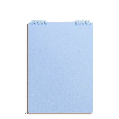 COMFORT spiral bound notebook in sky blue with durable cover and metal spiral binding for 360-degree page rotation.