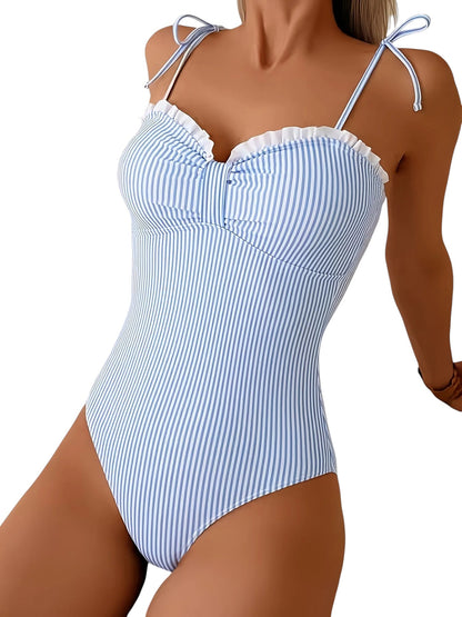 COMFORTH blue and white striped one piece swimsuit with ruffle trim and tie shoulder straps.