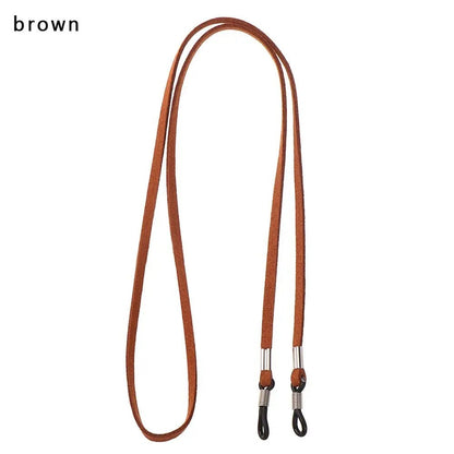 COMFORT brown suede eyeglass chain strap with adjustable silicone loops and metal connectors.