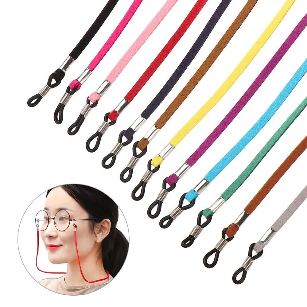 COMFORT suede eyeglass chain strap in multiple colors, with adjustable loops for secure grip.