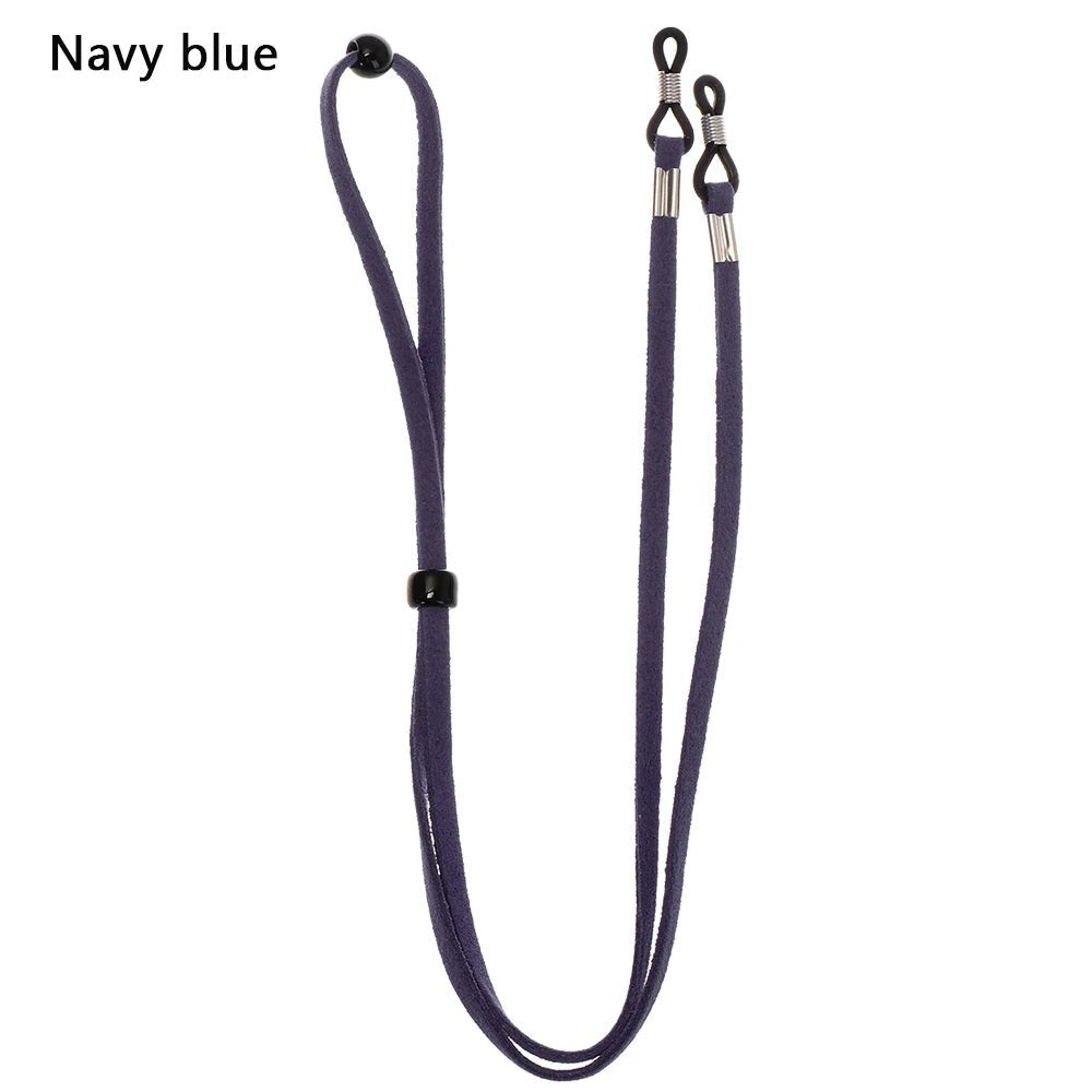 COMFORT navy blue suede eyeglass chain strap with adjustable silicone loops and metal connectors.