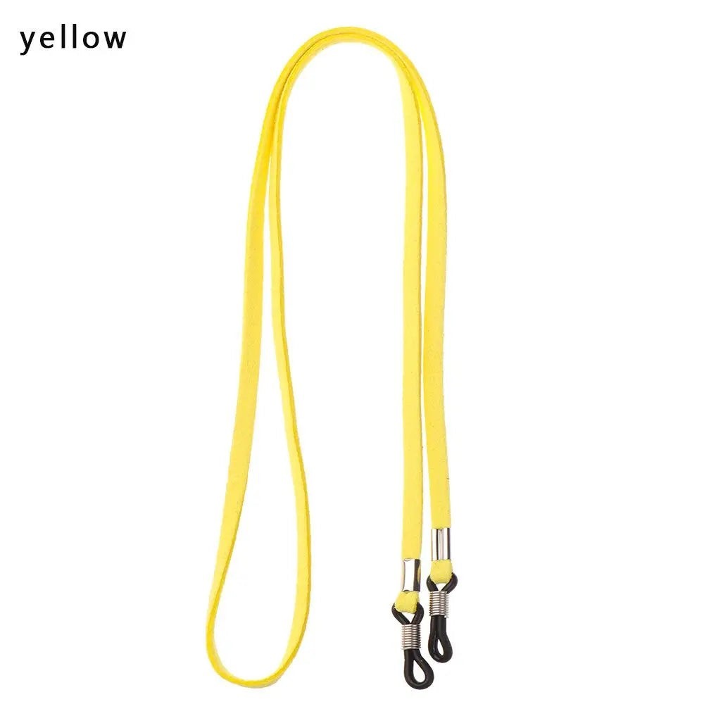 COMFORT yellow suede eyeglass chain strap with adjustable silicone loops and metal connectors.