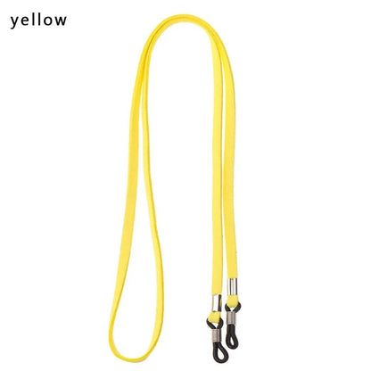 COMFORT yellow suede eyeglass chain strap with adjustable silicone loops and metal connectors.