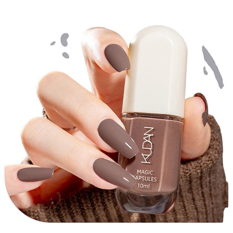 COMFORTH 10ml bottle of taupe water-based peel-off nail polish on coffin-shaped nails.