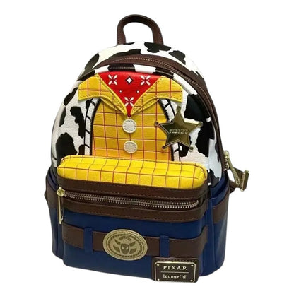 COMFORTH Toy Story Woody backpack with cow print, sheriff badge, and Pizza Planet details. Vegan leather.