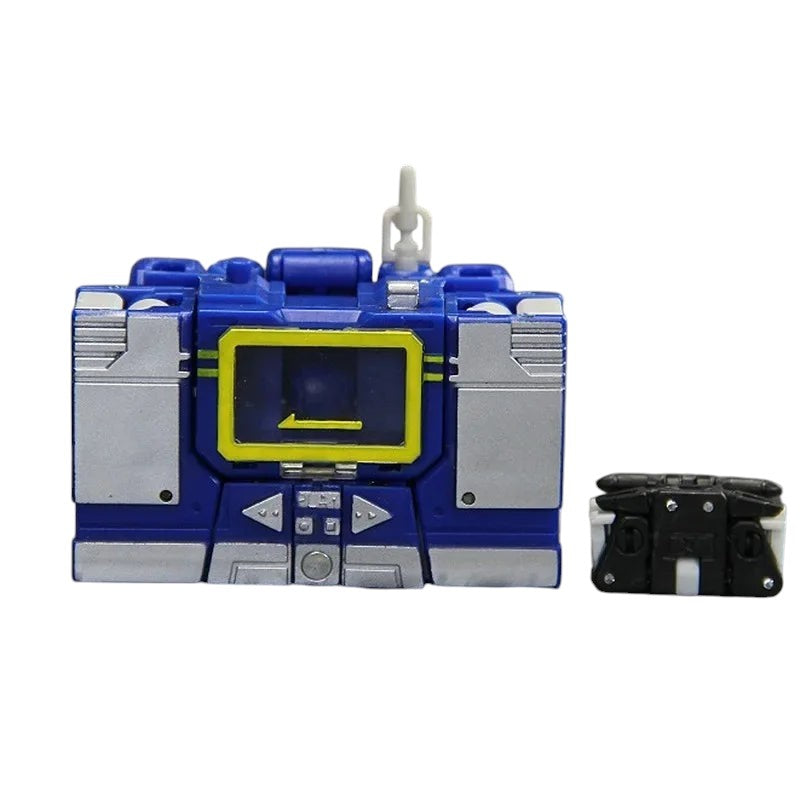 COMFORTH Transformers Soundwave action figure in boombox mode, blue with silver accents and yellow screen. Includes mini cassette accessory.