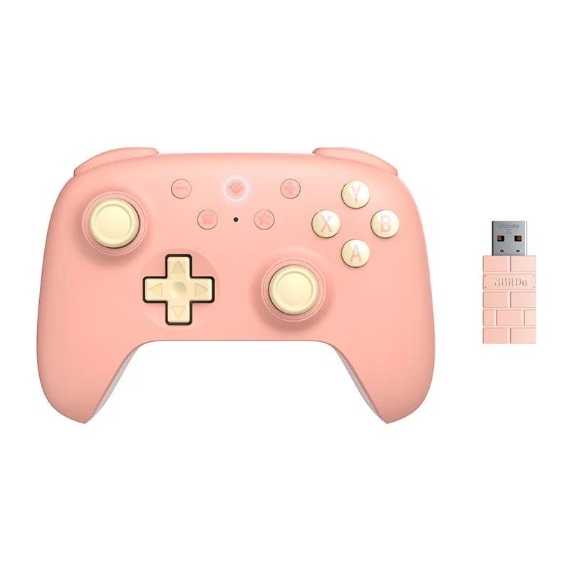 COMFORTH Ultimate 2C Wireless Gaming Controller in pastel mint with cream buttons and a USB dongle.