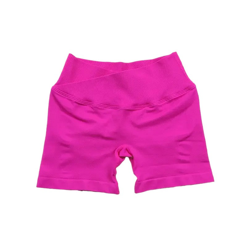 COMFORTHot pink seamless V-waist athletic shorts with a form-fitting design and breathable fabric.