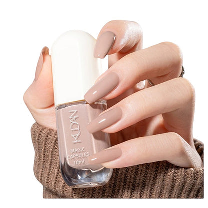 COMFORTH water-based peel off nail polish in nude shade, 10ml bottle. Long, elegant nails.