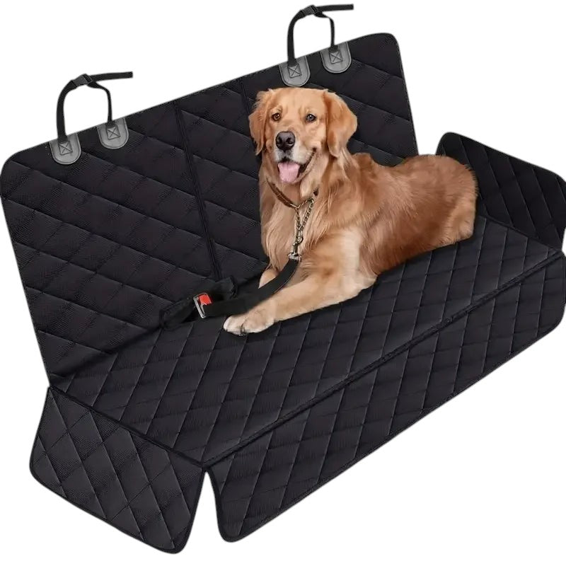 COMFORT black quilted waterproof car seat cover for back seat with a golden retriever resting on it.