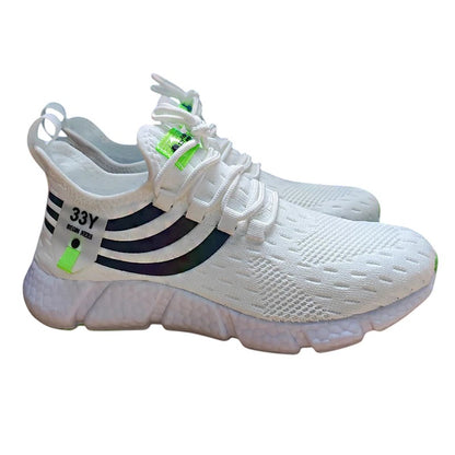 COMFORTH white athletic running sneakers with black stripes and neon green accents. Breathable mesh upper, cushioned sole.