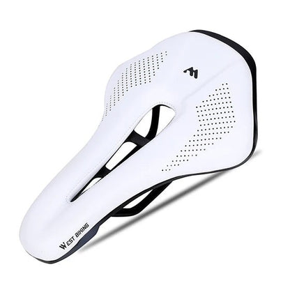 COMFORT white and black ergonomic bicycle saddle with central channel and textured grip for road or mountain biking.