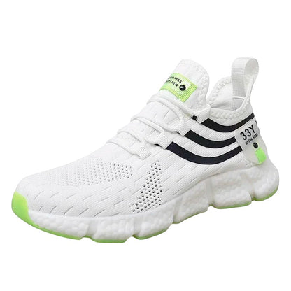 COMFORTH white mesh running sneakers with black stripes and neon green accents. Cushioned sole for comfort.