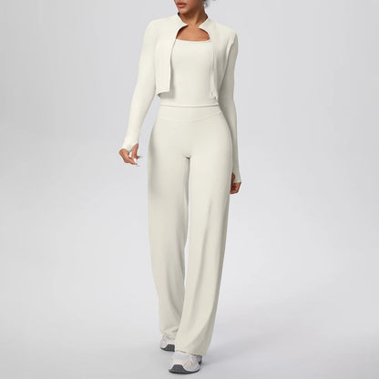 COMFORT Women's cream three-piece athletic set with cropped jacket, scoop-neck bra, and wide-leg pants.