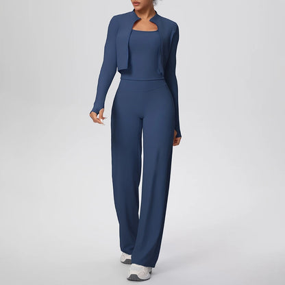 COMFORT Women's navy blue three-piece athletic set with cropped jacket, sports bra, and wide-leg pants.