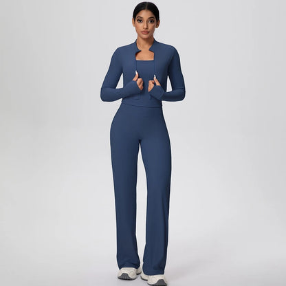 COMFORT Women's navy blue three-piece athletic set with cropped jacket, sports bra, and wide-leg pants.