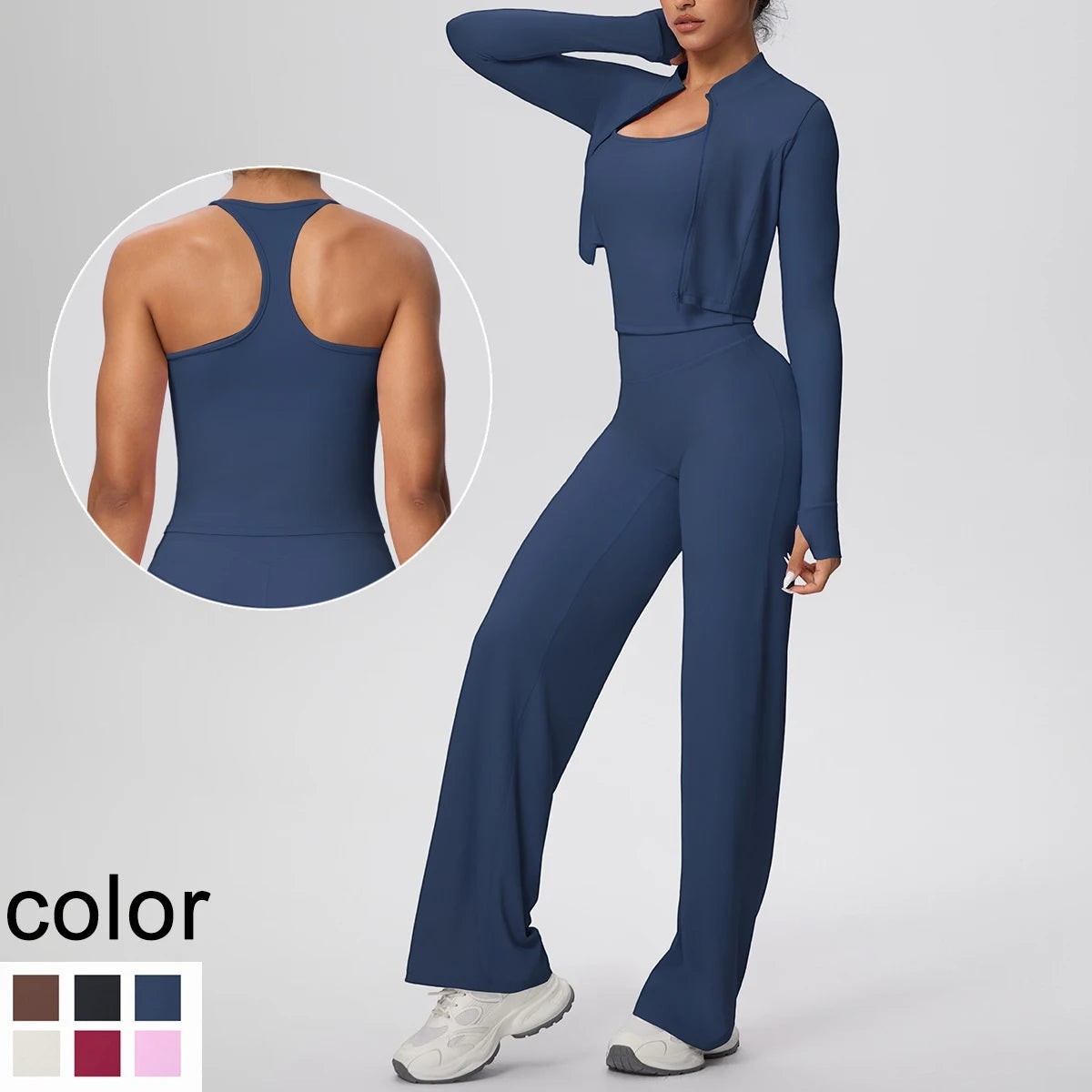 COMFORT Women's navy blue three-piece athletic set with cropped jacket, scoop-neck bra, and wide-leg pants.