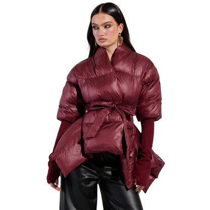 COMFORT Women's burgundy puffer jacket with tie belt, voluminous sleeves, and wide collar.