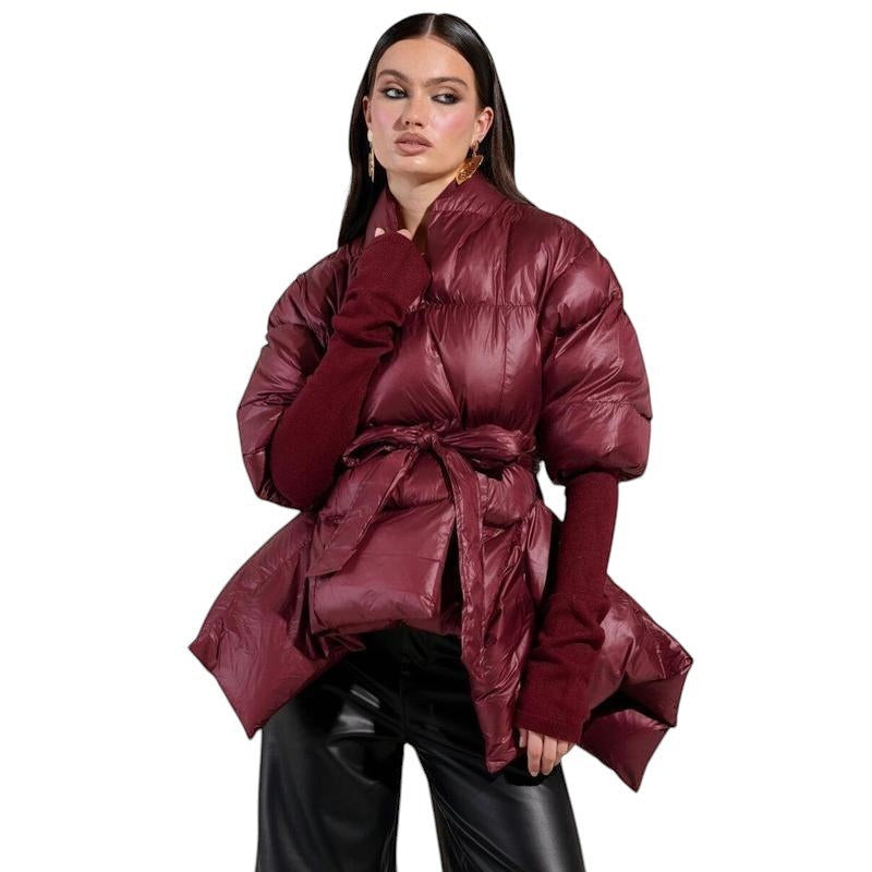 COMFORT women's burgundy puffer jacket with tie belt, voluminous sleeves, and wide collar.