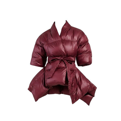 COMFORT Women's burgundy puffer jacket with belt, wrap silhouette, voluminous sleeves, and tie waist.