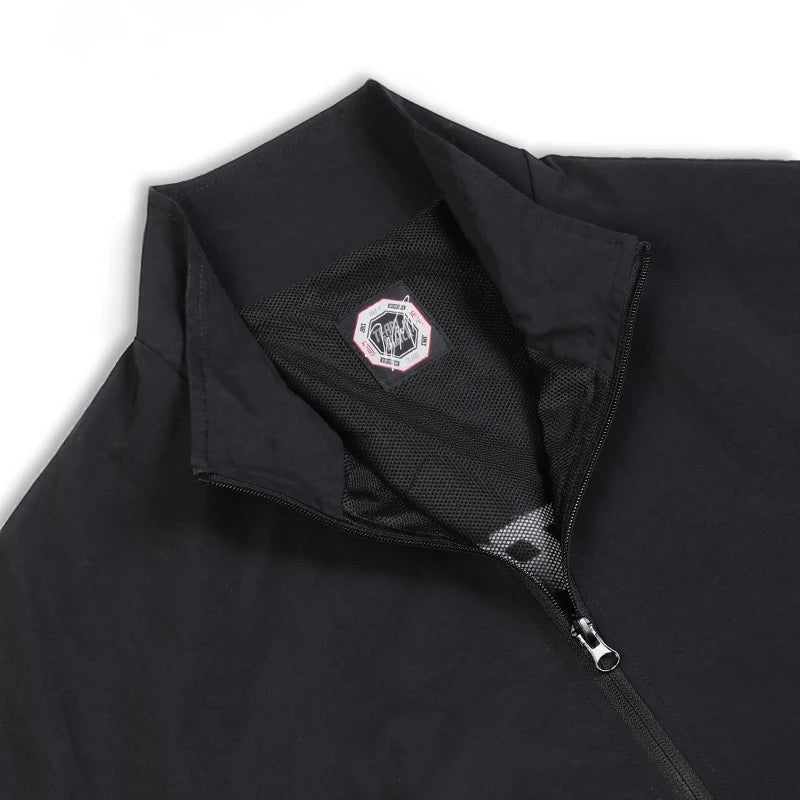 COMFORTH black track jacket with white piping and MMA Fighting Championship logo on the back.