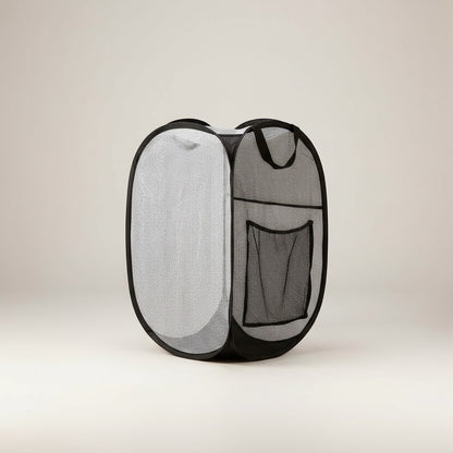 COMFORTH collapsible black mesh laundry hamper with handles and side pocket. Lightweight and breathable.
