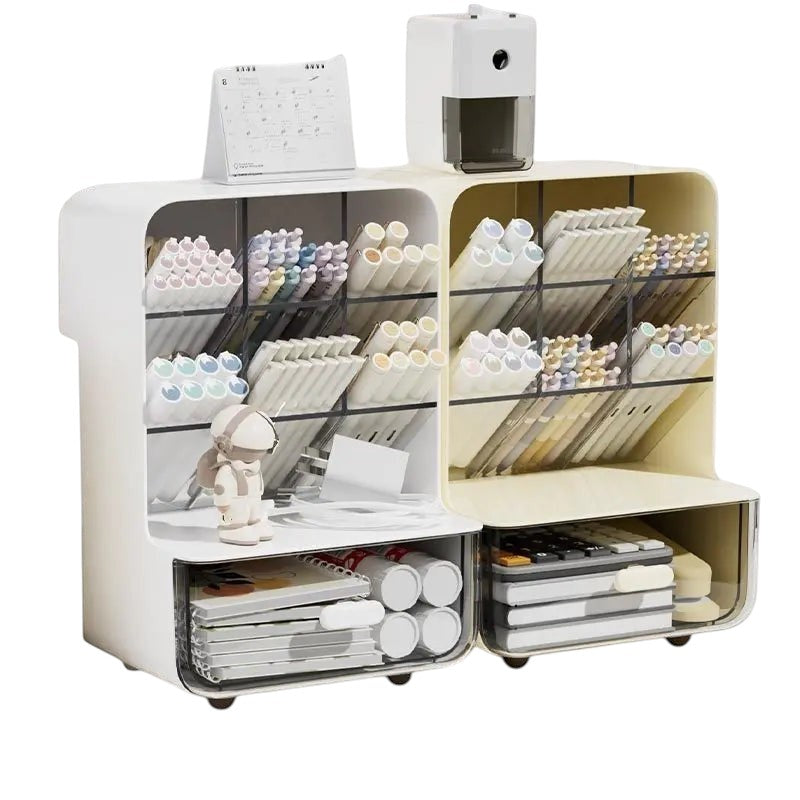 COMFORTH white and beige desk organizer with multiple compartments and drawers, holding pens, markers, notebooks, and a calculator.