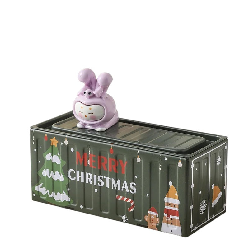 COMFORTH green metal storage container with a cute purple bunny figure on top, decorated with Christmas tree and Merry Christmas text.
