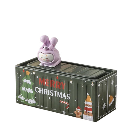 COMFORTH green metal storage container with a cute purple bunny figure on top, decorated with Christmas tree and Merry Christmas text.