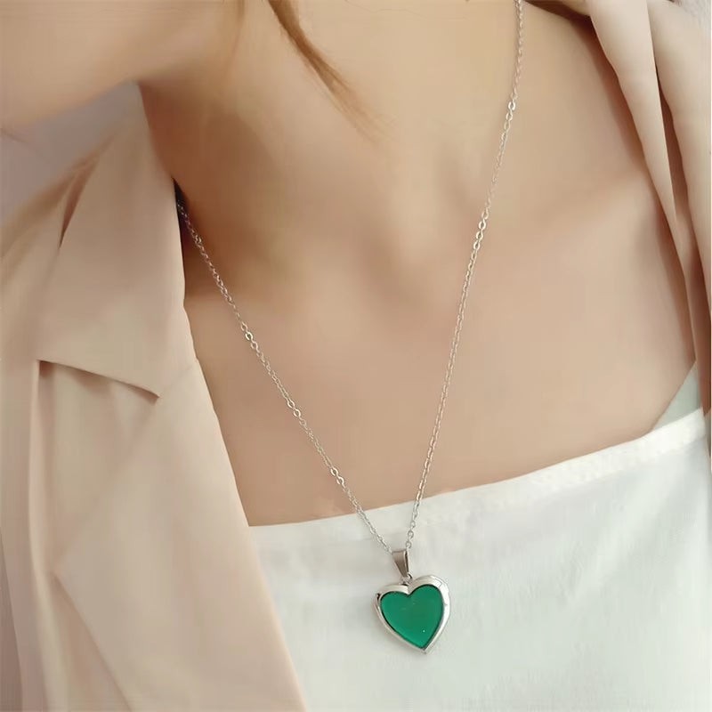 COMFORTH silver-tone heart locket pendant necklace with green mood stone on a delicate chain.