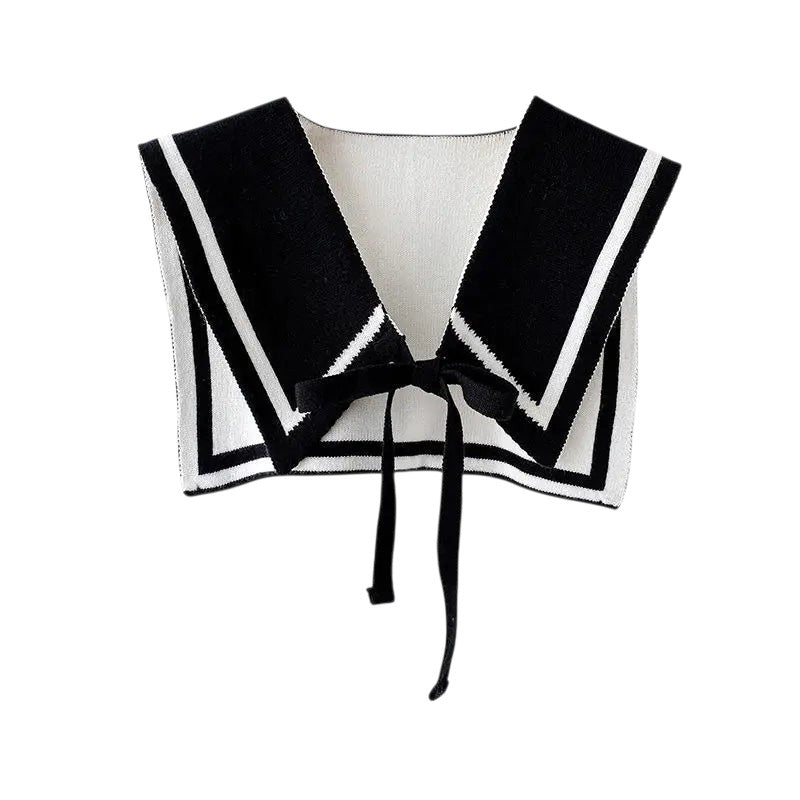 COMFORTH black and white knit sailor collar with contrasting trim and tie closure. Detachable accessory.