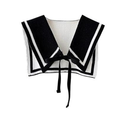 COMFORTH black and white knit sailor collar with contrasting trim and tie closure. Detachable accessory.