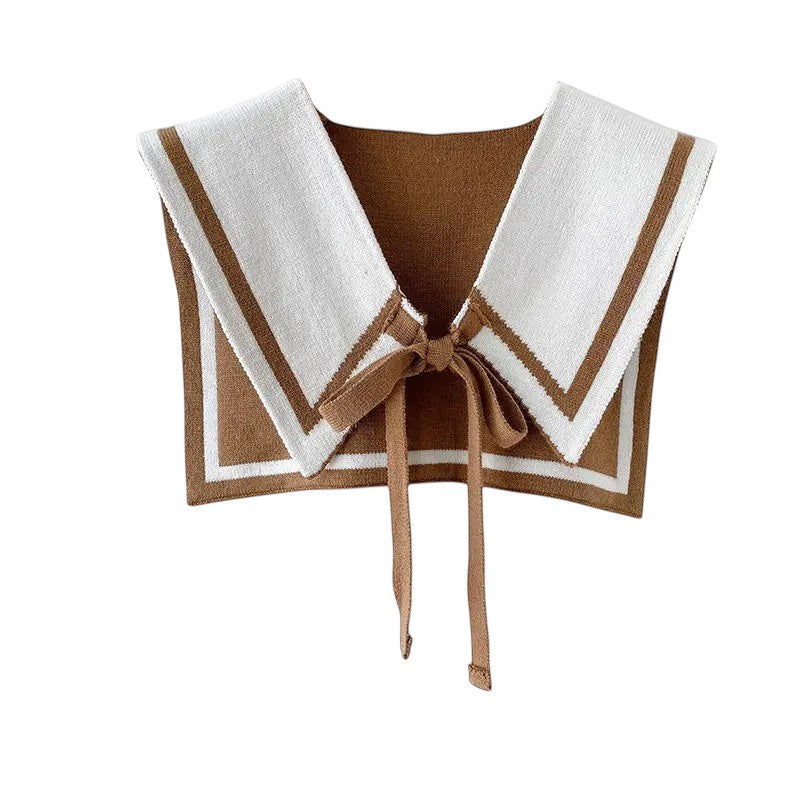 COMFORTH Knit sailor collar in brown and white with contrasting trim and tie closure. Detachable fake collar.