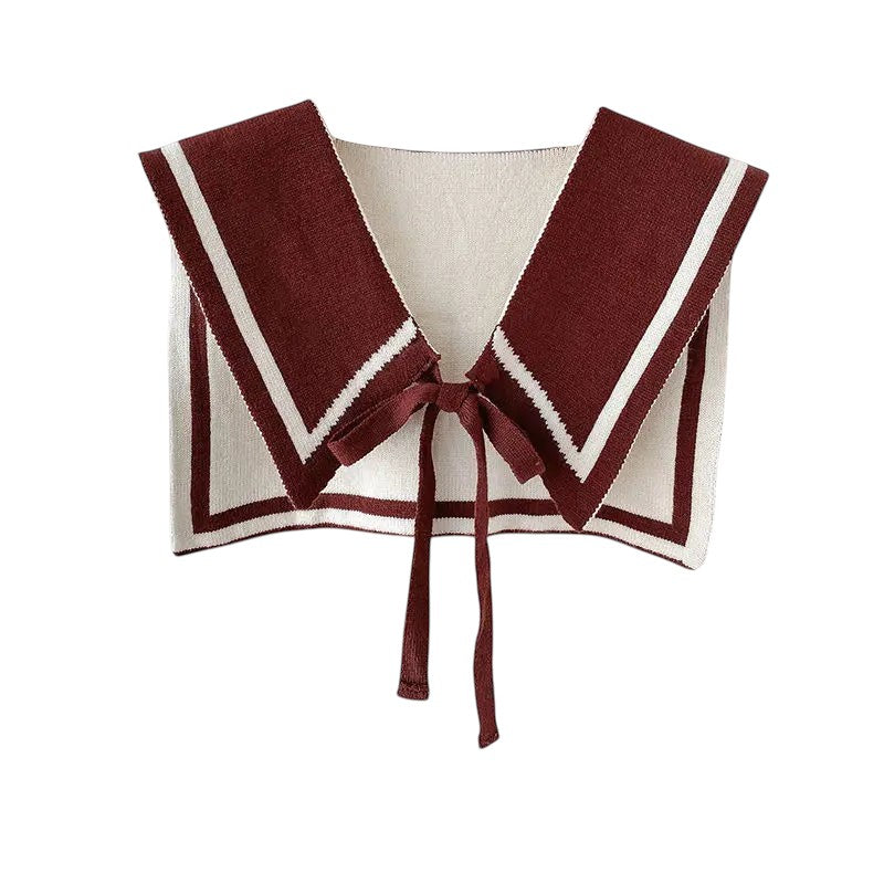 COMFORTH Knit sailor collar in cream with maroon trim and tie closure. Detachable accessory.